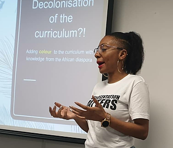 Aisha Thomas, Founder of Representation Matters, giving a talk 'Decolonising the curriculum'